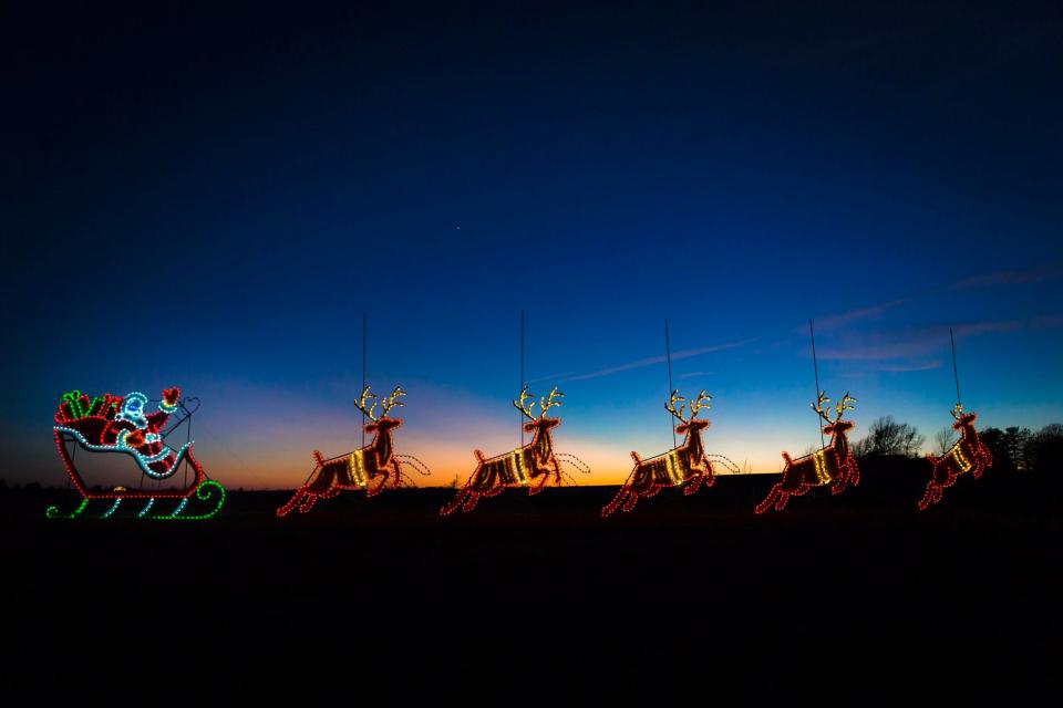 Santa and his reindeer are depicted at the Chickasaw Cultural Center Christmas Lights in Sulphur.