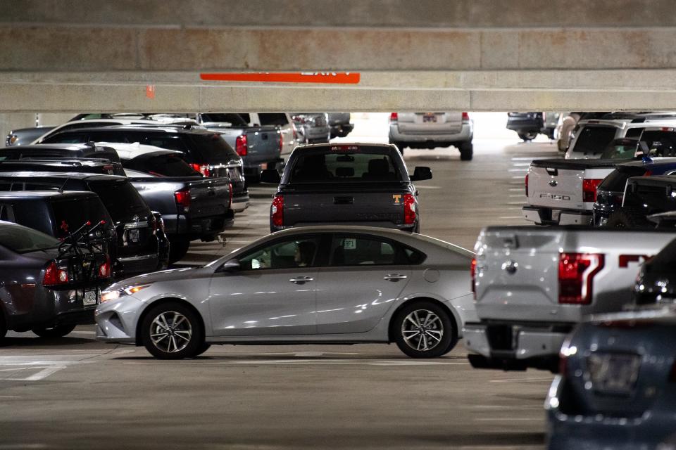 Drivers look for parking spaces in the G10 parking garage located between Neyland Stadium and Thompson-Boling Arena on the University of Tennessee at Knoxville campus Sept. 21, 2023.