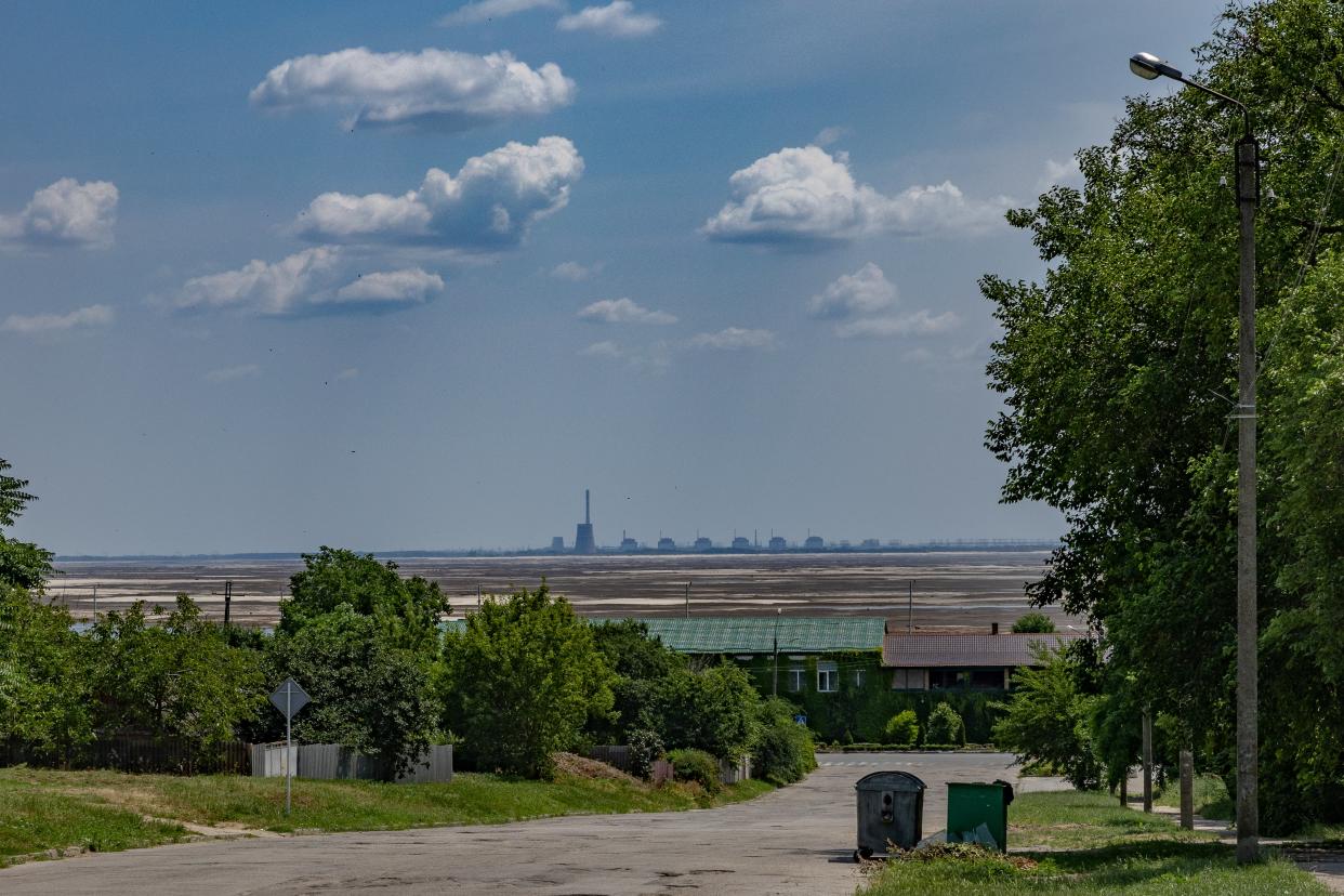 The Zaporizhzhia nuclear power plant overlooks the now dry Kakhkova reservoir and the city of Nikopol (Bel Trew)