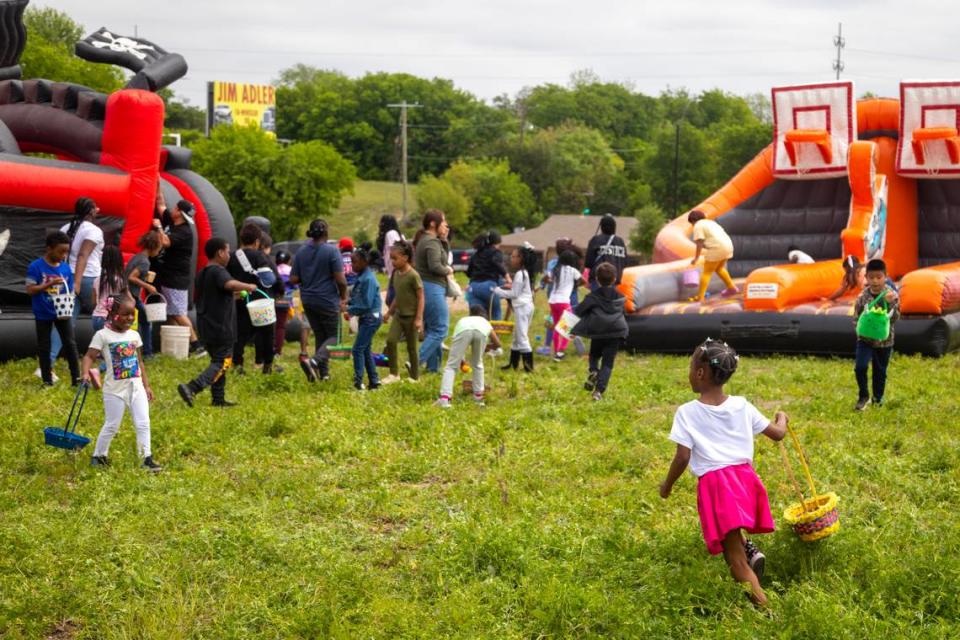 Kids search during the egg hunt at the Como Community Center in Fort Worth on Saturday, April 8, 2023.