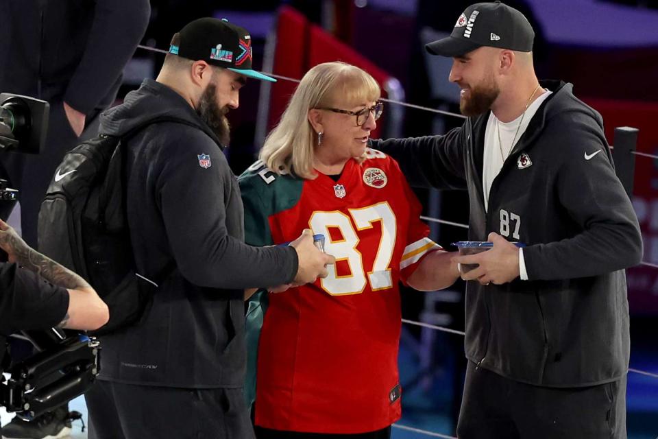 <p>Christian Petersen/Getty</p> Jason Kelce, Donna Kelce and Travis Kelce.