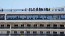 People are pictured on MSC Fantasia cruise ship in Lisbon