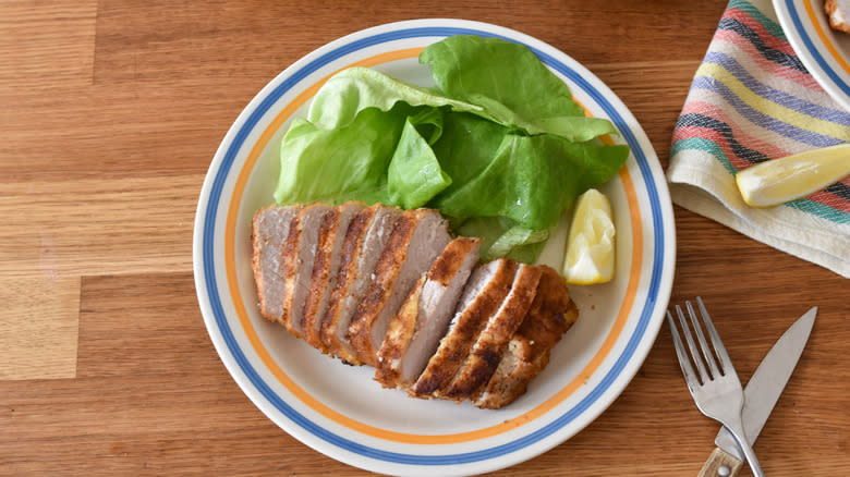 fried pork chop and salad