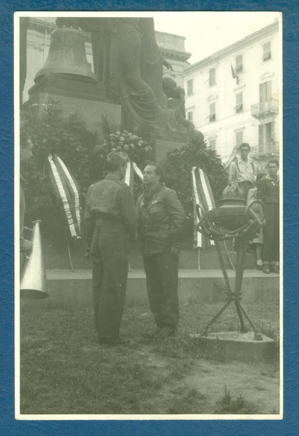 Comandante Enrico (right) transferring control of the city of Savona, Italy, from partisan to regular Italian army in May 1945.