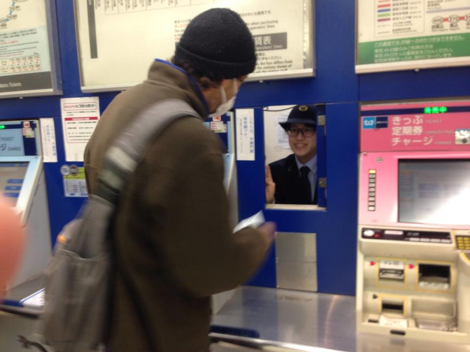 Man asks for help at a ticket window