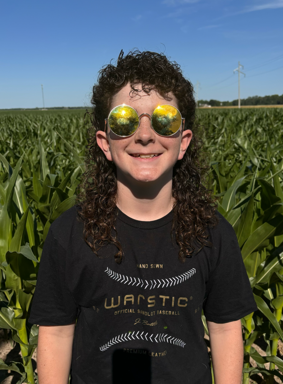 Killian Todd, 13, of Hamilton, Illinois, began growing out his mullet about four years ago after making a bet with his older cousin (Erica Todd)