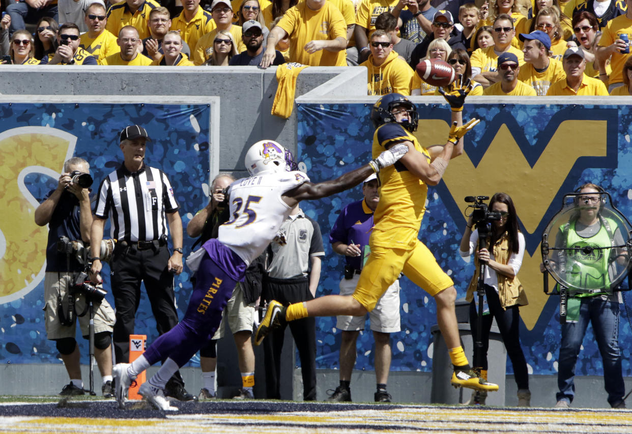 West Virginia wide receiver David Sills V (R) leads the country in touchdown receptions. (AP Photo/Raymond Thompson)