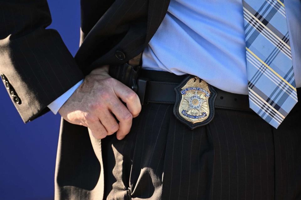 PHOTO: A member of the Secret Service monitors activity as President Joe Biden speaks at Tioga Marine Terminal, Oct. 13, 2023, in Philadelphia. (Mark Makela/Getty Images)