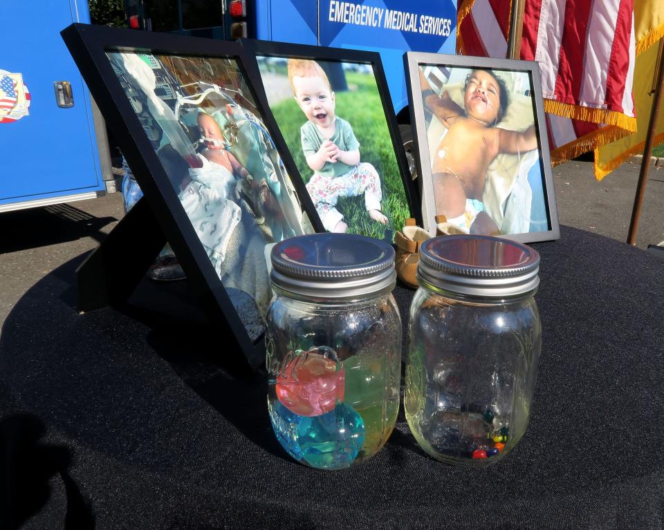 Children killed or injured by water beads are displayed during a November 13, 2023, press conference outside Jersey Shore University Medical Center in Neptune, NJ. Congressman Frank Pallone (D-N.J.) is planning to introduce legislation to ban the product , which are marketed for kids. The photos show (l-r): Kennedy Mitchell, Esther Bethard and Kipley Haugen.