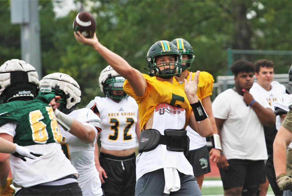Rock Bridge quarterback Sam Kaiser fires a pass during a practice scrimmage on July 19, 2023, in Columbia, Mo.