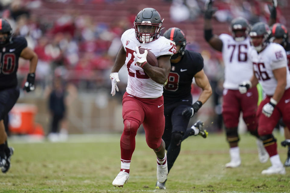 Washington State running back Nakia Watson (25) runs for a 41-yard touchdown against Stanford during the first half of an NCAA college football game in Stanford, Calif., Saturday, Nov. 5, 2022. (AP Photo/Godofredo A. Vásquez)