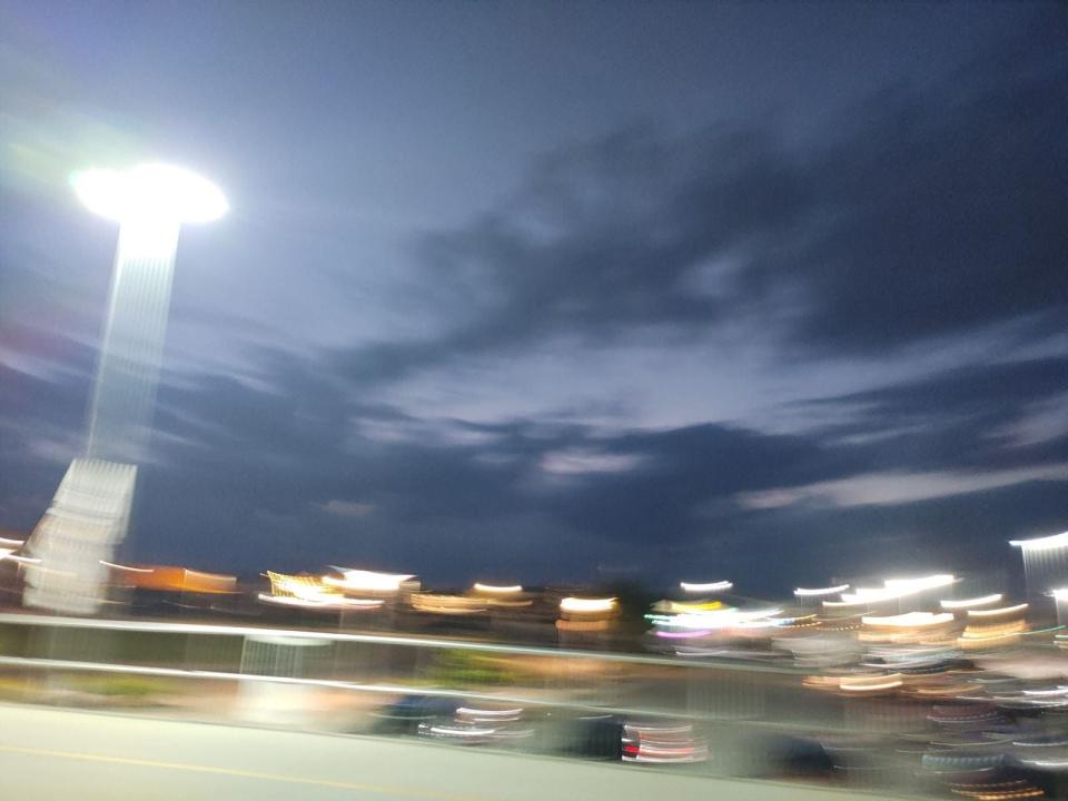 UFO sighting in Wildwood, NJ. A woman taking pictures of the night sky came across this luminous object on her pictures that she didn't see in person.