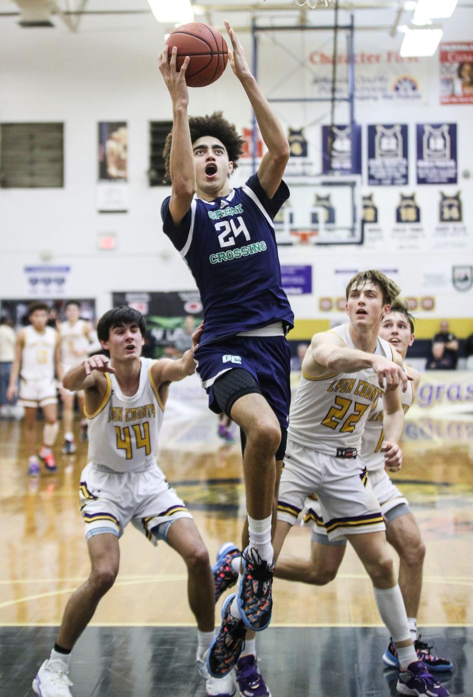 Great Crossing's Malachi Moreno goes for two while playing against Lyon County in Monday's King of the Bluegrass in Fairdale. Dec. 19, 2022 