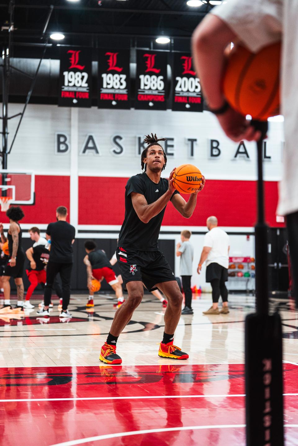 Khani Rooths shoots during a Louisville summer basketball practice at Planet Fitness Kueber Center.  Rooths is the only freshman on the Cardinals' 2024-25 roster.