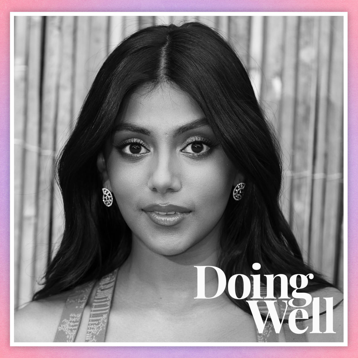  Charithra Chandran on a pink and purple ombré background with the text "Doing Well" . 