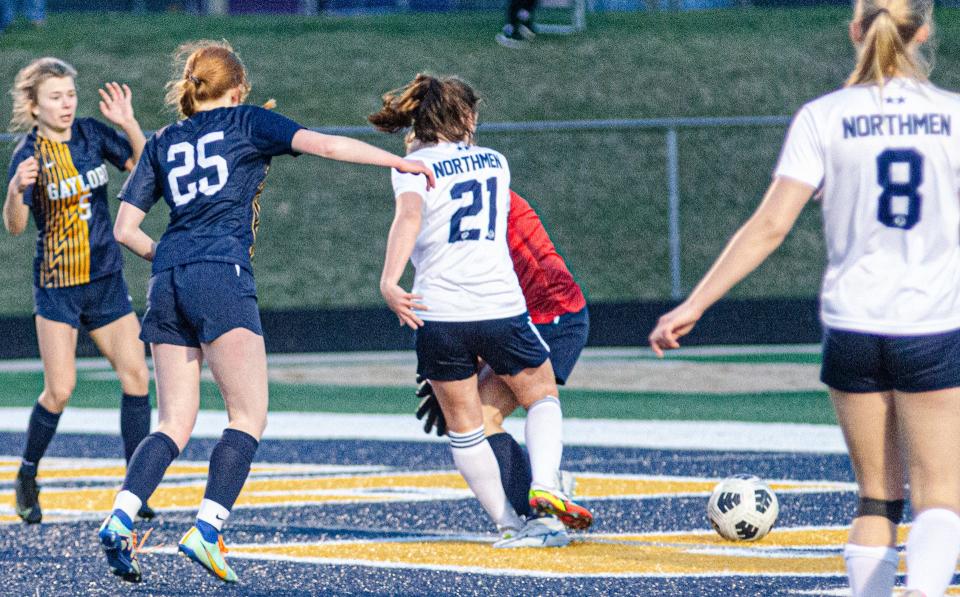 Petoskey's Haidyn Wegmann (21) knocks in the game-winning goal against Gaylord in the final 10 seconds of play Tuesday, keeping PHS unbeaten at 7-0.