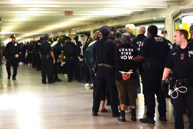 NYPD officers arrest protesters during a demonstration calling for a cease-fire amid war between Israel and Hamas, at Grand Central Station in New York City on Oct. 27.