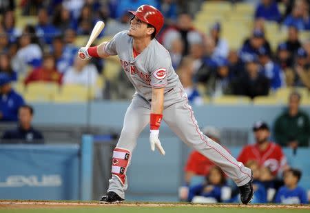 May 11, 2018; Los Angeles, CA, USA; Cincinnati Reds second baseman Scooter Gennett (3) hits a single in the first inning against the Los Angeles Dodgers at Dodger Stadium. Mandatory Credit: Gary A. Vasquez-USA TODAY Sports
