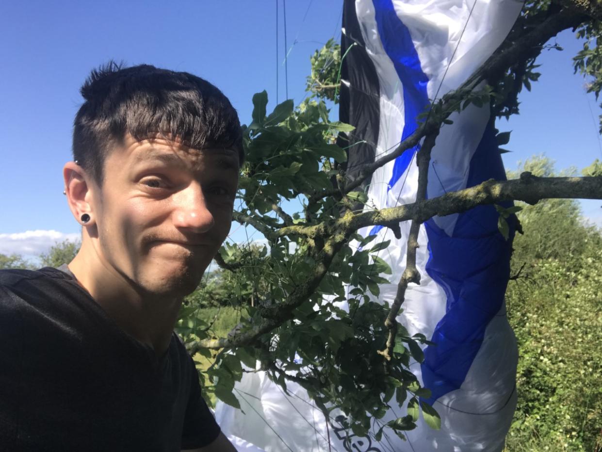 Daniel Jones after his canopy was caught in a tree (Daniel Jones/PA)