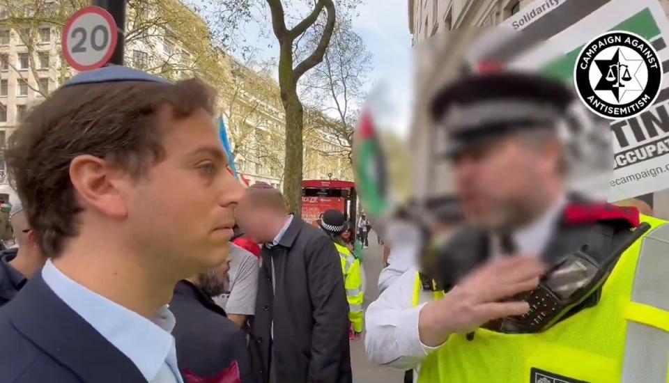 Gideon Falter was wearing a kippah skullcap when he was stopped from crossing the road near the demonstration in Aldwych on Saturday 13 April (Campaign Against Antisemitism/PA Wire)