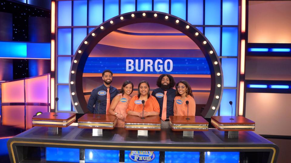 The Burgo family of Fall River stands on the set of "Family Feud." They taped two episodes of "Family Feud" in April 2023, which will air on Feb. 5 and 6.