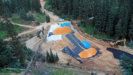 FILE PHOTO - Yellow mine waste water from the Gold King Mine collects in holding pools in San Juan County, Colorado, U.S. is seen in this picture released by the Environmental Protection Agency (EPA) taken on August 7, 2015. EPA/Handout via REUTERS