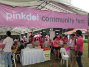 Free snacks and drinks are given to participants at the Pink Dot community tent. A total of 19 LGBT and community groups also set up booths there to raise awareness of their cause. (Yahoo! photo/Melissa Law)