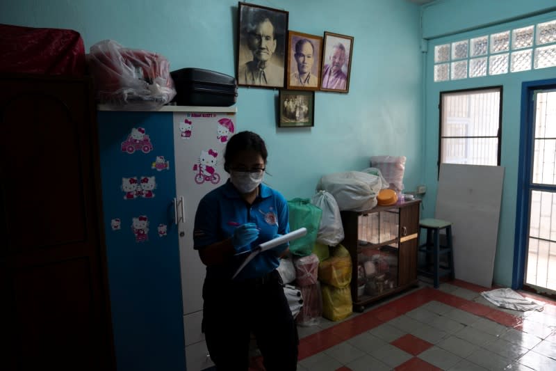 The Wider Image: Calls to suicide helpline show Thais' stress in downturn