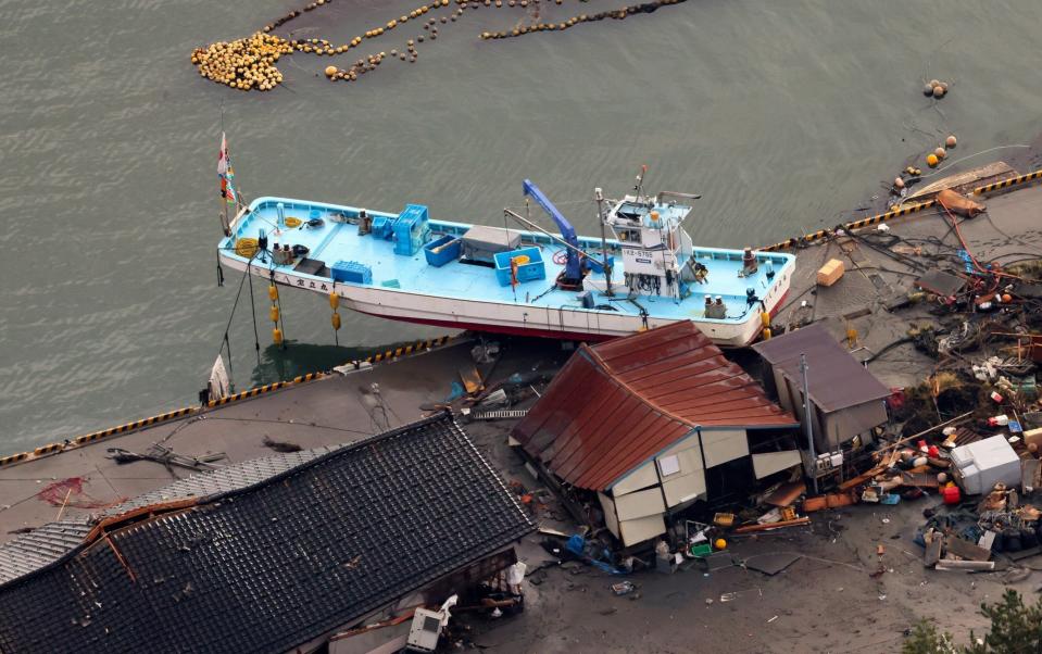 Boats were washed away by a tsunami triggered by multiple strong earthquakes