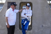 CORRECTS BYLINE TO MICHAEL CONROY INSTEAD OF DAVE PARKER - Bobby Rahal talks with his son and driver Graham Rahal before qualifications for the for the final three starting spots in the Indianapolis 500 auto race at Indianapolis Motor Speedway in Indianapolis, Sunday, May 21, 2023. (AP Photo/Michael Conroy)