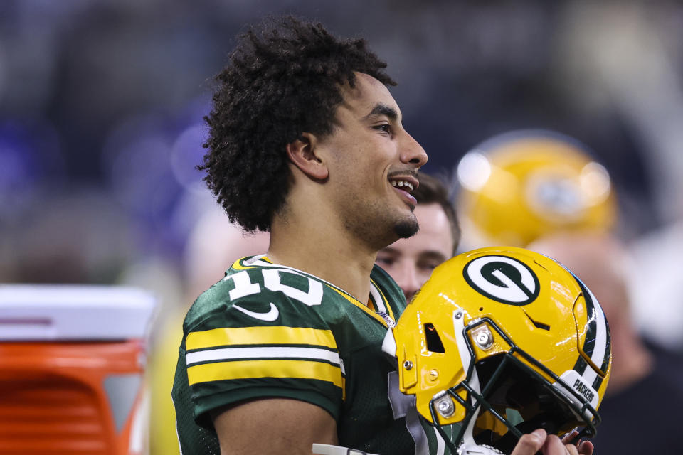 ARLINGTON, TX - JANUARY 14: Jordan Love #10 of the Green Bay Packers looks on from the sideline during an NFL wild-card playoff football game against the Dallas Cowboys at AT&T Stadium on January 14, 2024 in Arlington, Texas. (Photo by Perry Knotts/Getty Images)