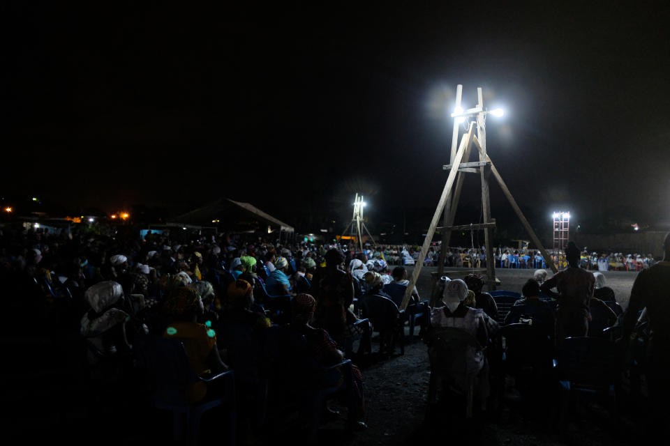 Crowds sit for late-night church service in Obuasi, Ghana. (Photo: Francis Kokoroko/Reuters)
