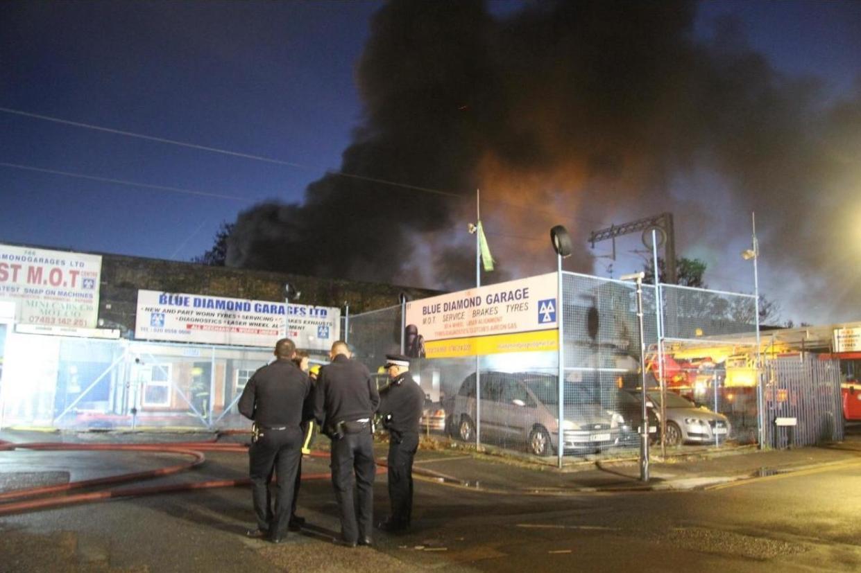 Dozens of firefighters tackle huge blaze at car repair workshop in Walthamstow: Paul Wood