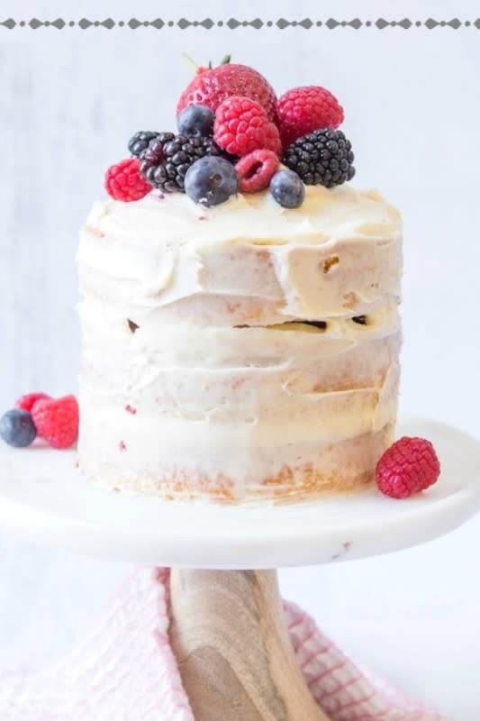 <p>The Organic Kitchen</p><p>This mini cake is just the right amount of cake, delicious frosting and beautiful, fresh berries.</p><p><strong>Get the recipe: <a href="https://www.theorganickitchen.org/mini-vanilla-cake-with-berries/" rel="nofollow noopener" target="_blank" data-ylk="slk:Triple Layer Mini Vanilla Cake for Two;elm:context_link;itc:0;sec:content-canvas" class="link rapid-noclick-resp">Triple Layer Mini Vanilla Cake for Two</a></strong></p><p><strong>Related: <a href="https://parade.com/936811/felicialim/12-decadent-naked-cakes-youll-fall-in-love-with/" rel="nofollow noopener" target="_blank" data-ylk="slk:30 Decadent Naked Cakes;elm:context_link;itc:0;sec:content-canvas" class="link rapid-noclick-resp">30 Decadent Naked Cakes</a></strong></p>