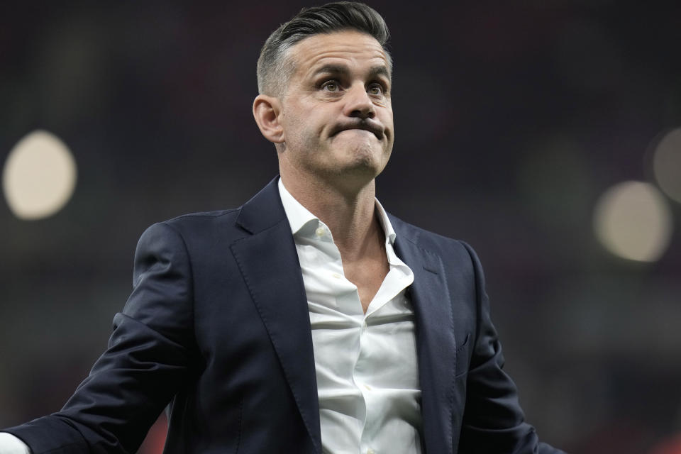 Canada's head coach John Herdman reacts at the end of the World Cup group F soccer match between Belgium and Canada, at the Ahmad Bin Ali Stadium in Doha, Qatar, Wednesday, Nov. 23, 2022. Belgium won 1-0. (AP Photo/Hassan Ammar)