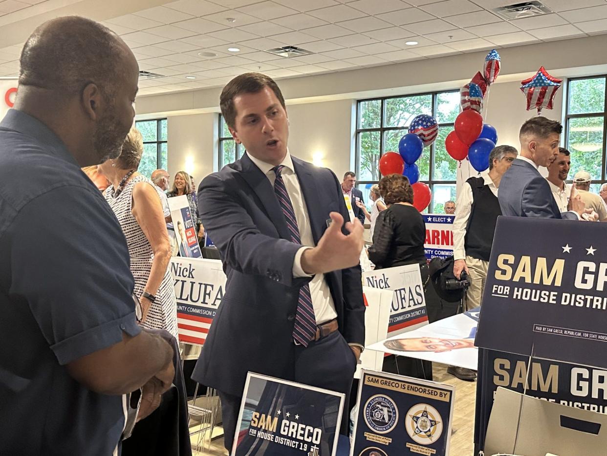 Sam Greco, a candidate for Florida House of Representatives District 19, meets voters at the Flagler Tiger Bay Candidate Meet and Greet Thursday, June 27, 2024, at the Palm Coast Community Center.