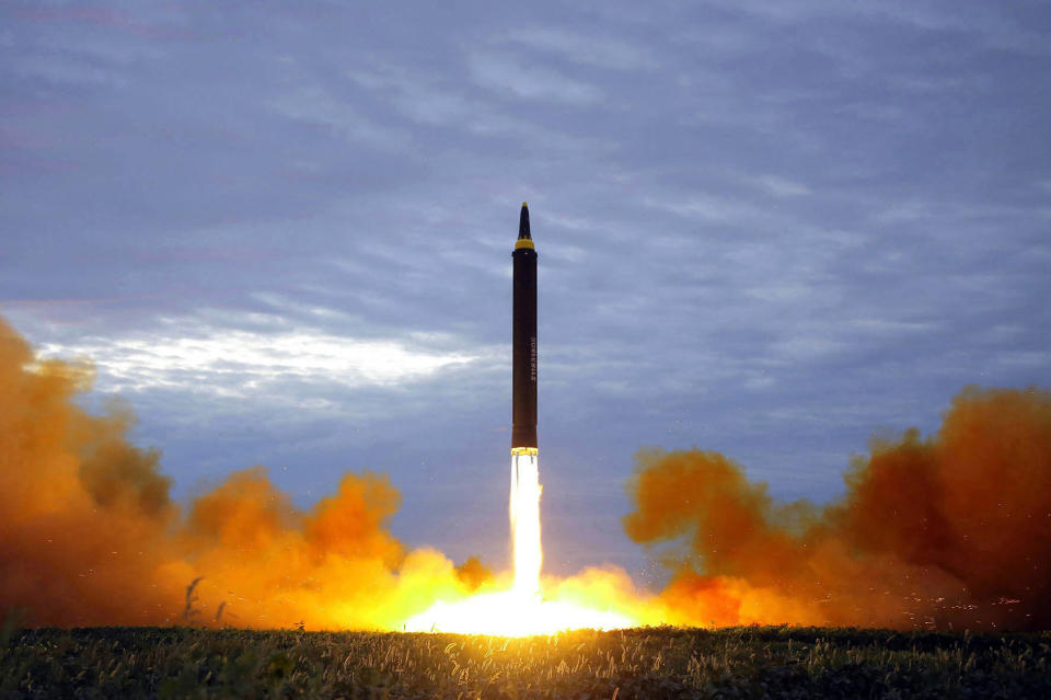 FILE - This photo provided by the North Korean government shows what was said to be the test launch of a Hwasong-12 intermediate range missile in Pyongyang, North Korea on Aug. 29, 2017. The content of this image is as provided and cannot be independently verified. Korean language watermark on image as provided by source reads: "KCNA" which is the abbreviation for Korean Central News Agency. (Korean Central News Agency/Korea News Service via AP, File)