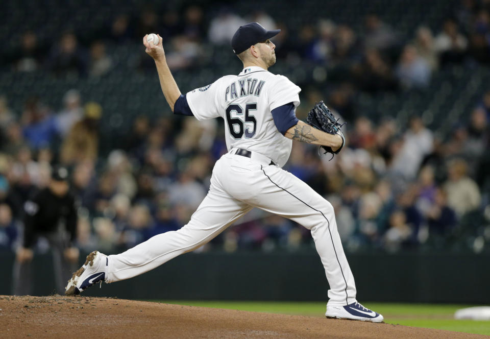 Seattle Mariners starting pitcher James Paxton works against the Oakland Athletics during the first inning of a baseball game, Monday, Sept. 24, 2018, in Seattle. (AP Photo/John Froschauer)