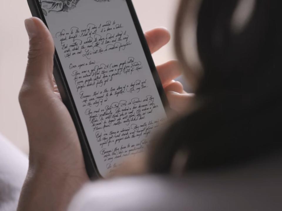 Meghan pulls up her wedding speech on her phone in "Harry & Meghan."