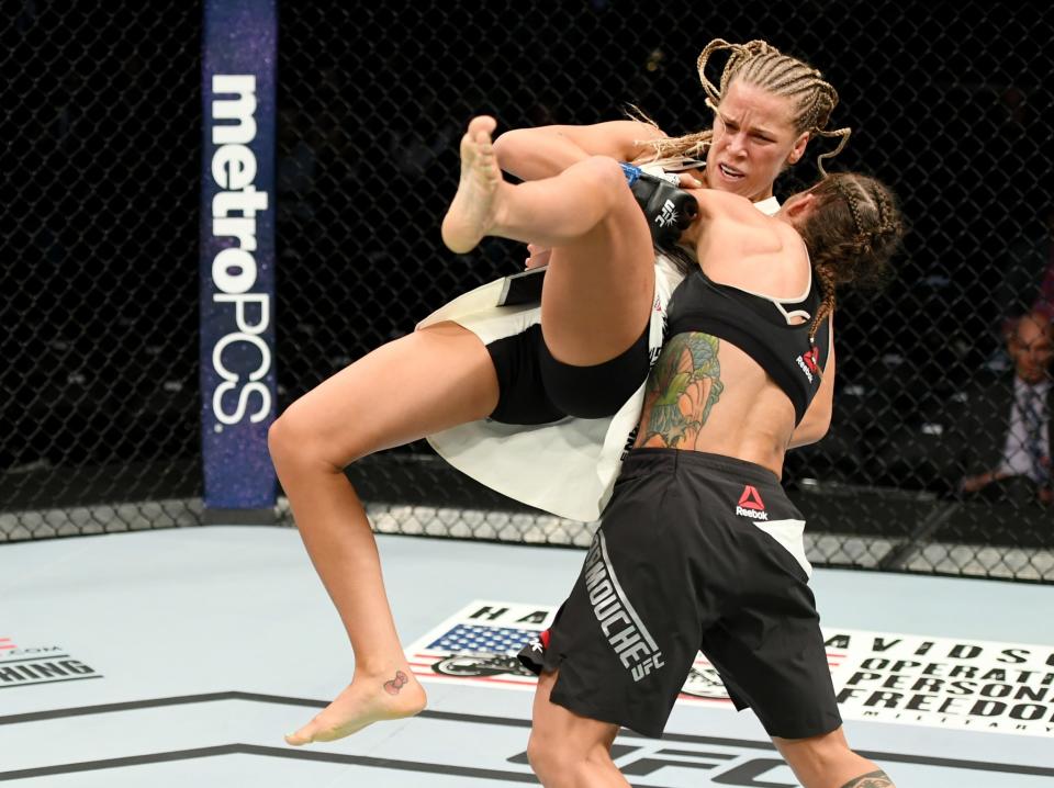 <p>Liz Carmouche of the United States (right) fights against Katlyn Chookagian of the United States in their women’s bantamweight bout during the UFC 205 event at Madison Square Garden on November 12, 2016 in New York City. (Photo by Jeff Bottari/Zuffa LLC/Zuffa LLC via Getty Images) </p>