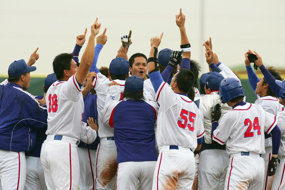 林智勝（圖中）在杜哈亞運打出致勝一擊，助中華隊首度稱霸亞運棒球項目。（Photo by Martin Rose/Getty Images for DAGOC）