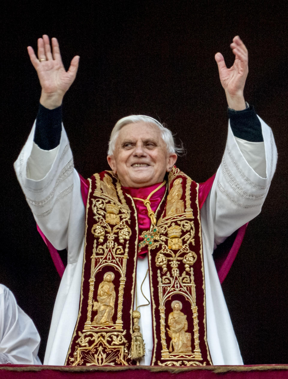 FILE - Pope Benedict XVI greets the crowd from the central balcony of St. Peter's Basilica at the Vatican soon after his election on April 19, 2005. Pope Emeritus Benedict XVI, the German theologian who will be remembered as the first pope in 600 years to resign, has died, the Vatican announced Saturday. He was 95. (AP Photo/Domenico Stinellis, File)