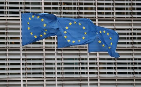 European Flags are seen outside the EU Commission headquarters on the eve of a EU summit in Brussels