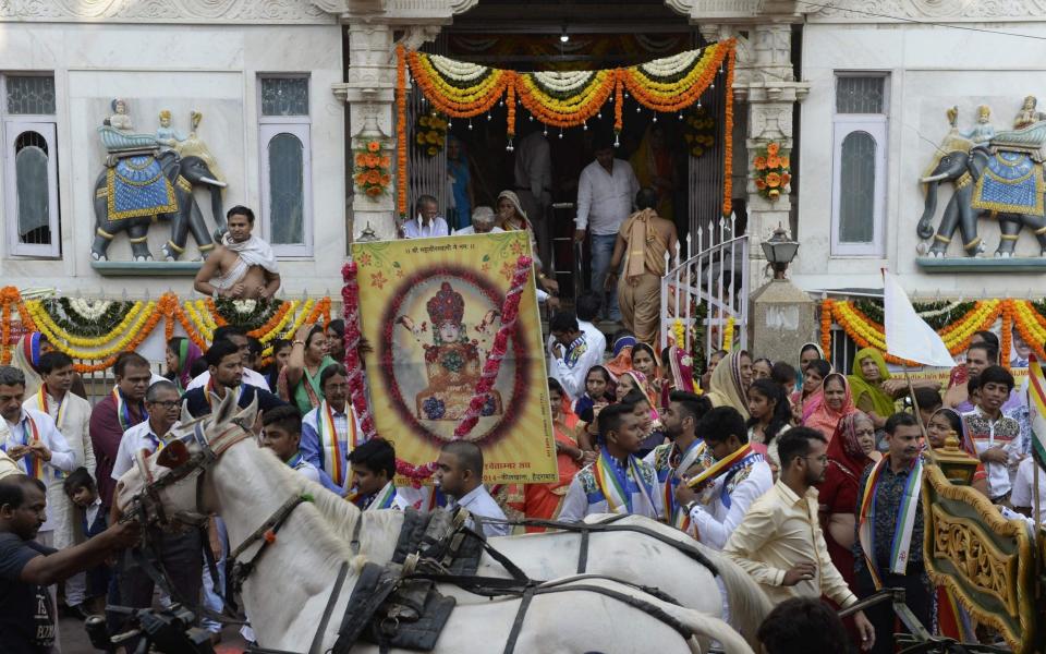 Indian devotees from the Jain community take part in a procession - AFP