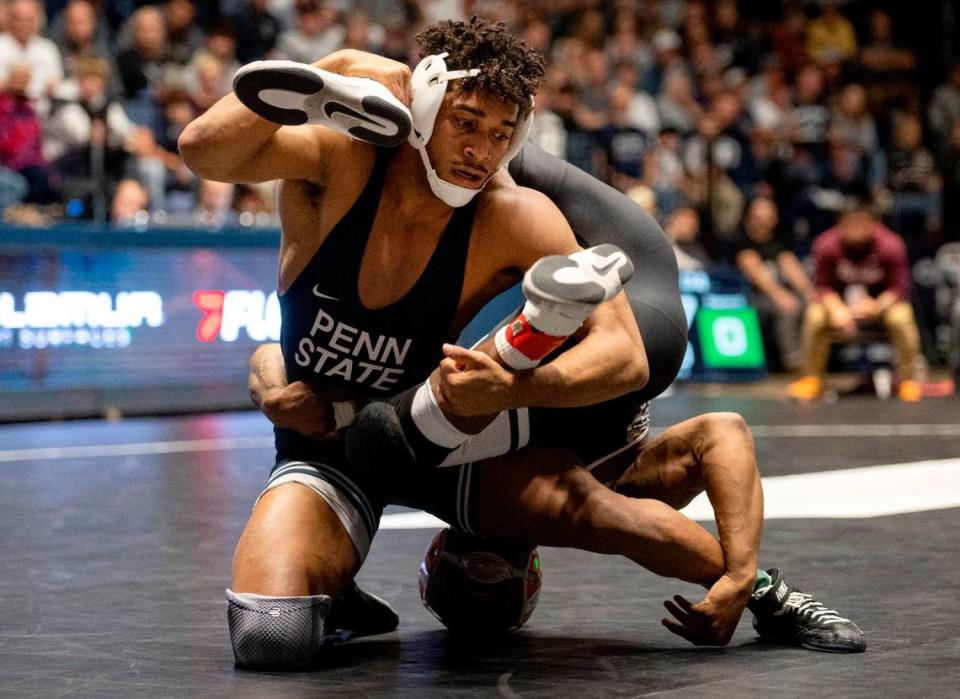 Penn State’s Carter Starocci controls Virginia Tech’s Mekhi Lewis in the 174 lb bout of the National Wrestling Coaches Association All-Star Classic at Rec Hall on Tuesday, Nov. 21, 2023.