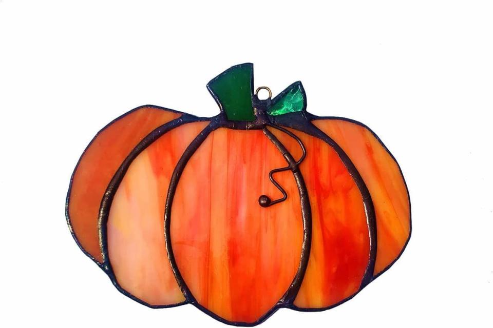 <p><strong>BOXCASA</strong></p><p>amazon.com</p><p><strong>$29.99</strong></p><p>Get the stained glass pumpkin look for less with this beauty. </p>