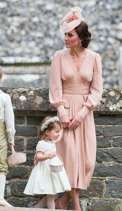 Kate spent a lot of the ceremony looking after the children. Photo: AP