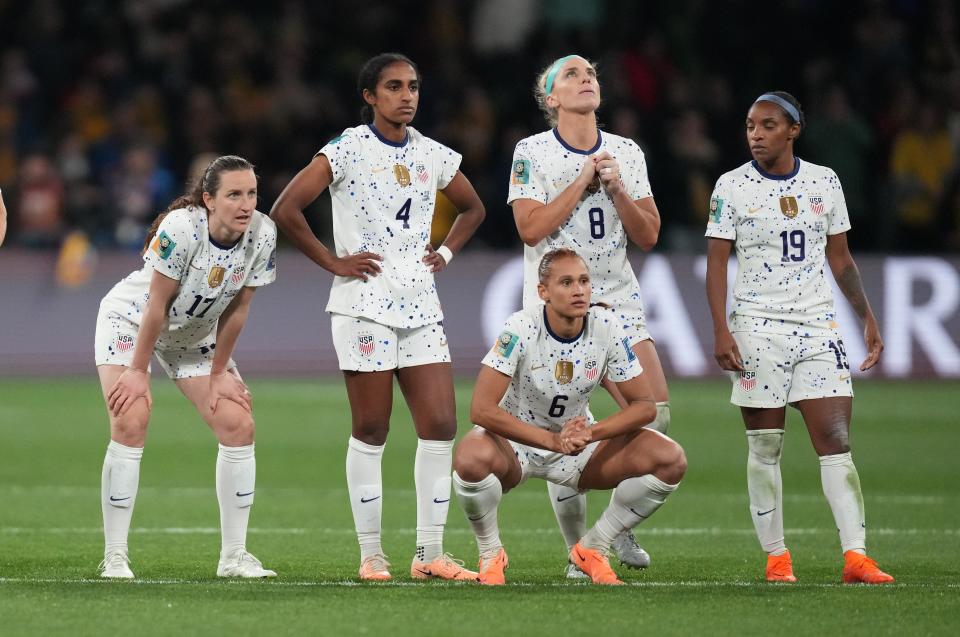 USWNT players Andi Sullivan (17), Naomi Girma (4), Lynn Williams (6), Julie Ertz (8) and Crystal Dunn (19) react during the penalty shootout loss to Sweden in the World Cup Round of 16.