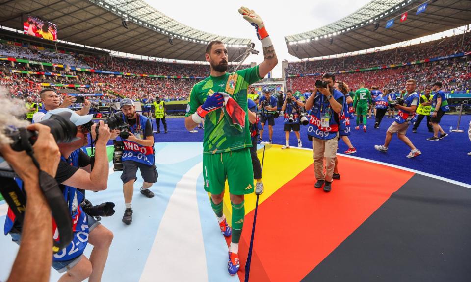 <span>Gianluigi Donnarumma apologises to the <a class="link " href="https://sports.yahoo.com/soccer/teams/italy-women/" data-i13n="sec:content-canvas;subsec:anchor_text;elm:context_link" data-ylk="slk:Italy;sec:content-canvas;subsec:anchor_text;elm:context_link;itc:0">Italy</a> fans after being knocked out by Switzerland.</span><span>Photograph: Michael Zemanek/Shutterstock</span>