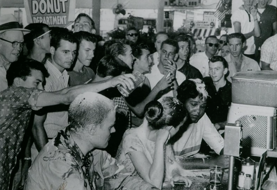 Civil rights activists 59 years ago photographed staging a sit-in to protest segregation at Woolworth's lunch counter in Jackson, Mississippi.  